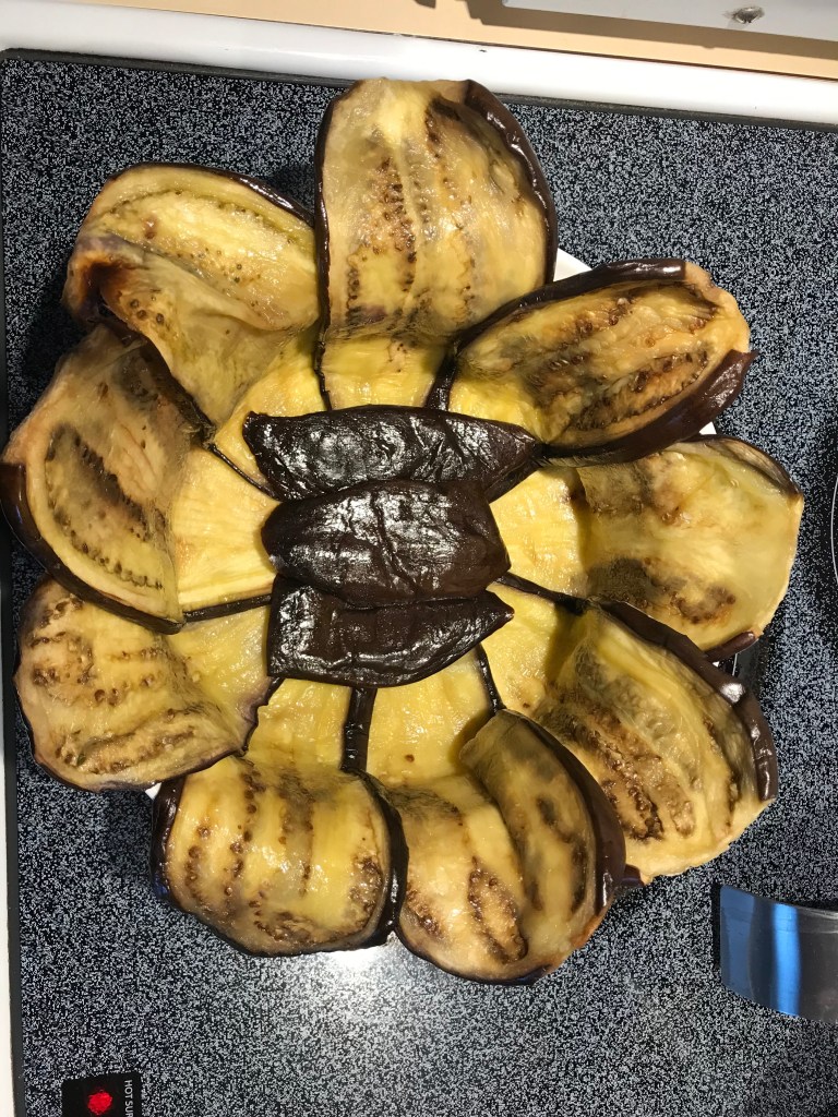 Eggplant timbale lining the dish